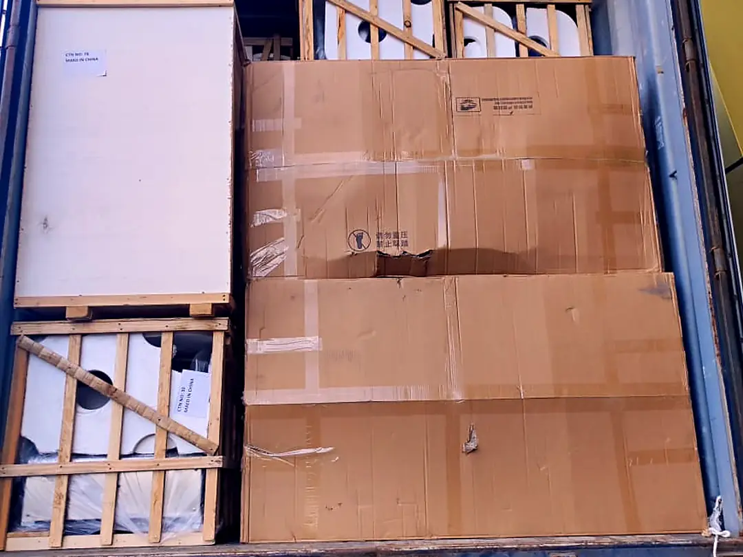 Cartons packed in a container