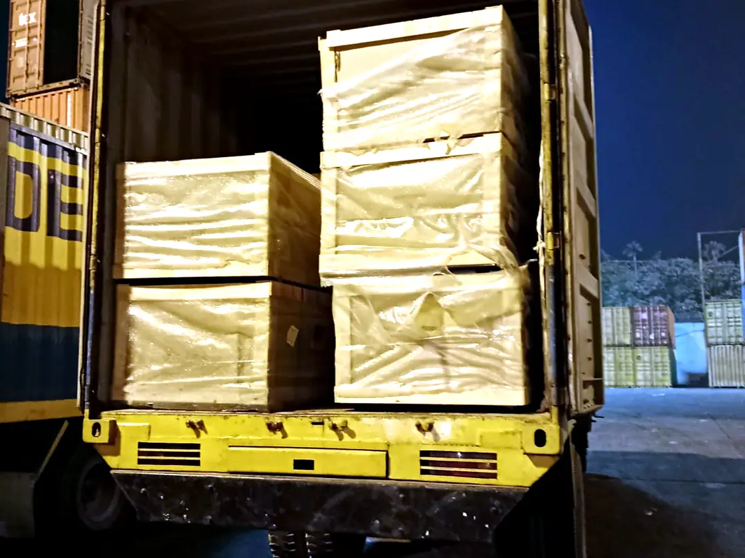 Crated cargo in an open container