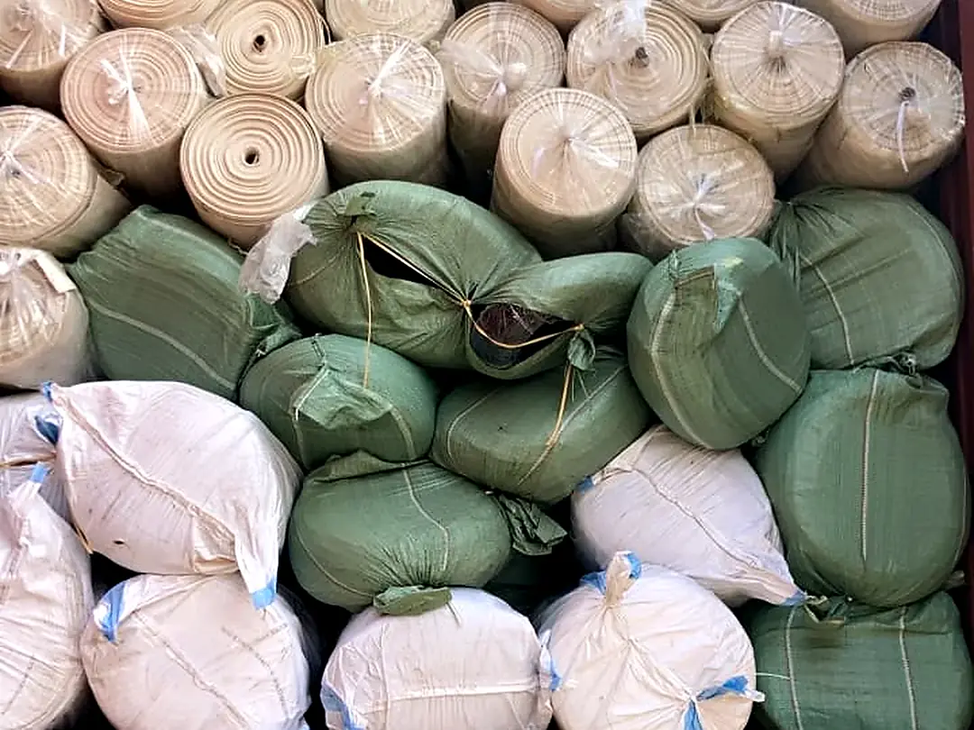 Rolled textiles loaded as cargo